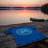It's Lake Time text design with stylized lake graphic on a blue t-shirt