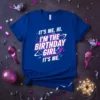 Blue t-shirt with bold white, pink, and blue text that reads "IT'S ME, HI. I'M THE BIRTHDAY GIRL IT'S ME."