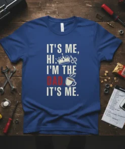 IT'S ME, HI. I'M THE DAD. IT'S ME. text design with crown, gears, and coffee cup graphic on blue t-shirt