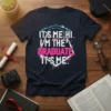 It's Me Hi I'm The Graduate T-Shirt with graduation cap graphic and colorful splatters