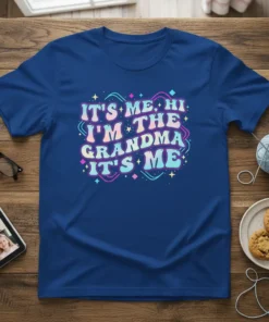 Retro style t-shirt design with the text "IT'S ME, HI I'M THE GRANDMA IT'S ME" in pastel wavy font