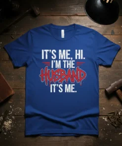 IT'S ME, HI. I'M THE HUSBAND IT'S ME. text on a blue t-shirt, funny husband quote design