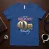 It's Miss Ms. Mrs. Dr. Actually text design on a royal blue v-neck t-shirt, featuring gold circuitry-style "Dr." and script