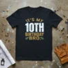 It's My 10th Birthday Bro! text with cracked effect and cake graphics on a black t-shirt