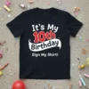 Black t-shirt with "It's My 10th Birthday Sign My Shirt!" in white and red text, celebrating a tenth birthday