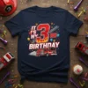 It's My 3rd Birthday text with a red fire truck graphic and celebratory confetti on a navy t-shirt