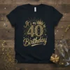 Gold "It's my 40th Birthday" text with a crown graphic on a black t-shirt, perfect for birthday celebrations