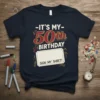 It's My 50th Birthday Sign My Shirt text design on a navy blue t-shirt, with a blank space for signatures