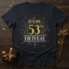 IT'S MY 53rd BIRTHDAY text design with gold and silver glitter accents and festive fireworks graphic on a black t-shirt