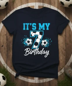 IT'S MY 7 Birthday text with soccer ball graphic and number 7 design on a navy t-shirt