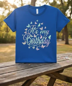 It's my Birthday text with colorful butterflies on a blue t-shirt, celebratory design for birthdays