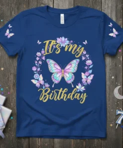 It's my Birthday text with a colorful butterfly and floral wreath on a navy blue t-shirt