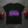 Black t-shirt with neon pink and purple "it's my Birthday" text and graphic elements including hearts and stars