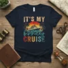 It's My Birthday Cruise text with a cruise ship and sunset graphic on a navy t-shirt