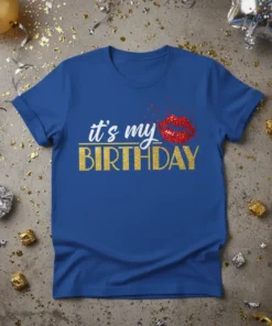 Blue t-shirt with "it's my BIRTHDAY" text in white and gold glitter, featuring red glitter lips and stars