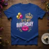 It's My Birthday t-shirt with crown, balloons, and lips graphic in bold lettering