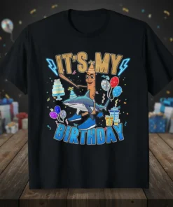 It's My Birthday text with a hot dog riding a shark graphic, balloons, and cake