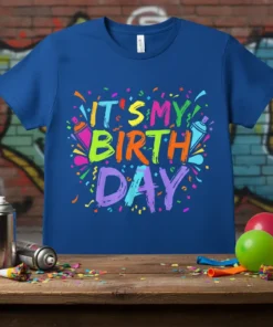 Royal blue t-shirt with colorful "IT'S MY BIRTH DAY" text, confetti, and spray paint graphics