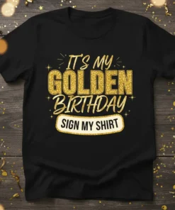 Black t-shirt with "It's My Golden Birthday Sign My Shirt" in gold glitter text, perfect for birthday celebrations