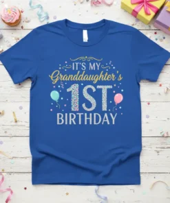 IT'S MY Granddaughter's 1ST BIRTHDAY text with sparkling numbers and balloons on a royal blue t-shirt