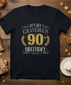 Black t-shirt with "IT'S MY GRANDMA'S 90TH BIRTHDAY" in gold and white glittery text, surrounded by laurel wreaths