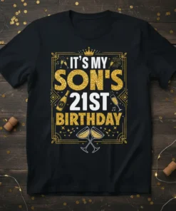 It's My Son's 21st Birthday text with gold glitter, champagne glasses, and a crown graphic on a black t-shirt