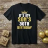 Black t-shirt with "IT'S MY SON'S 30TH BIRTHDAY" text and a gold crown graphic