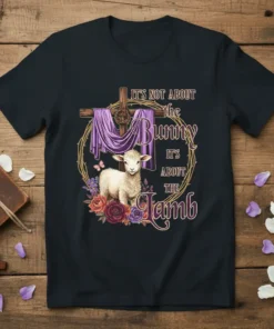 Religious Easter T-Shirt with text "It's Not About the Bunny It's About the Lamb" featuring a cross and a lamb