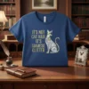 It's Not Cat Hair It's Siamese Glitter quote with a decorative Siamese cat graphic on a navy blue t-shirt