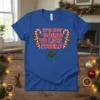 Christmas t-shirt with the text "It's Not Going To Lick Itself" in bold red letters, surrounded by candy canes and