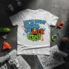 White t-shirt with vibrant graffiti-style text reading "IT'S NOT GOING TO LICK itself" in blue, orange, and green