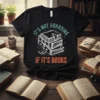 Black t-shirt with "It's Not Hoarding If It's Books" quote and stack of books graphic