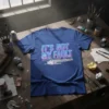 IT'S NOT MY FAULT text with glitch effect and circuit board graphic on a blue t-shirt