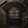 Humorous t-shirt with text "It's Not A Bald Spot It's A Solar Panel For A Sex Machine" in bold, retro