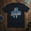 Dark t-shirt featuring the text "It's Not A Solar Panel It's A Solar Panel For A Sex Machine" with a