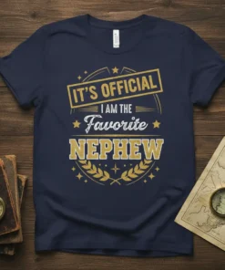 It's Official I Am The Favorite Nephew text design on a navy blue t-shirt, featuring gold and white typography and