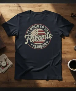 Navy t-shirt with "It's Official I'm The Favorite Grandson" text and American flag graphic