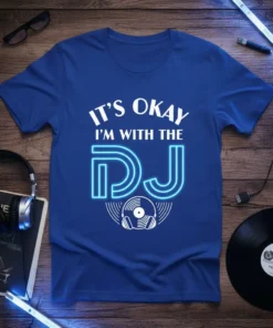 Blue t-shirt with white text "IT'S OKAY I'M WITH THE DJ" and neon blue DJ graphic with headphones and vinyl