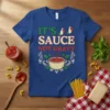 Blue t-shirt with "IT'S SAUCE NOT GRAVY" text in Italian flag colors and a steaming pot of sauce graphic