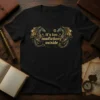 Black t-shirt with "it's too nonfictiony outside" text and two detailed dragon graphics