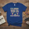 It's Weird Being The Same Age As Old People funny quote t-shirt with retro graphics and silhouettes of elderly people