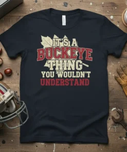 It's A Buckeye Thing You Wouldn't Understand text design on a navy t-shirt with distressed font and maple leaf graphic