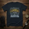 It's a Gambino Thing You Wouldn't Understand text design on a black t-shirt with gold and white lettering