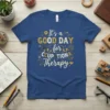 Blue t-shirt with "It's a GOOD DAY for OCCUPATIONAL Therapy" text and small graphics related to therapy