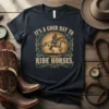 T-shirt with "It's A Good Day To Ride Horses" text and vintage illustration of a person riding a horse