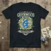 T-shirt with "IT'S A GREENWOOD THING YOU WOULDN'T UNDERSTAND" text and a large blue 'G' graphic