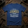 IT'S A JAMES THING you wouldn't UNDERSTAND! text design on a royal blue t-shirt, bold gold and white lettering