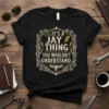 Black t-shirt with "It's A Jay Thing You Wouldn't Understand" text in decorative gold and white font, featuring lightning bolts