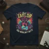 It's a Taylor vibe you wouldn't get it text with colorful guitar and wings graphic on a navy t-shirt
