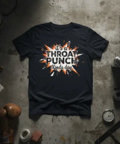 Black t-shirt with bold white and orange text reading "it's a THROAT PUNCH Kinda day" in a dynamic, explosive graphic